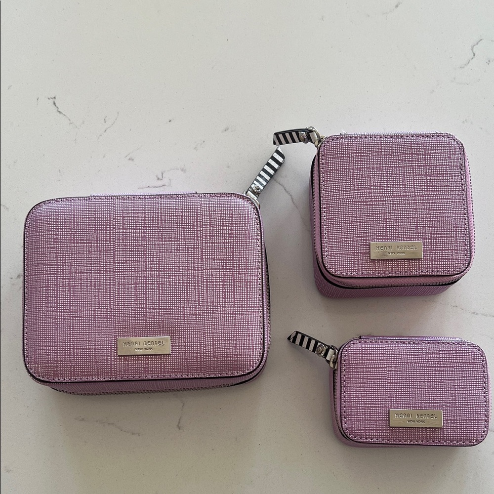 Henri Bendel set of small travel bags